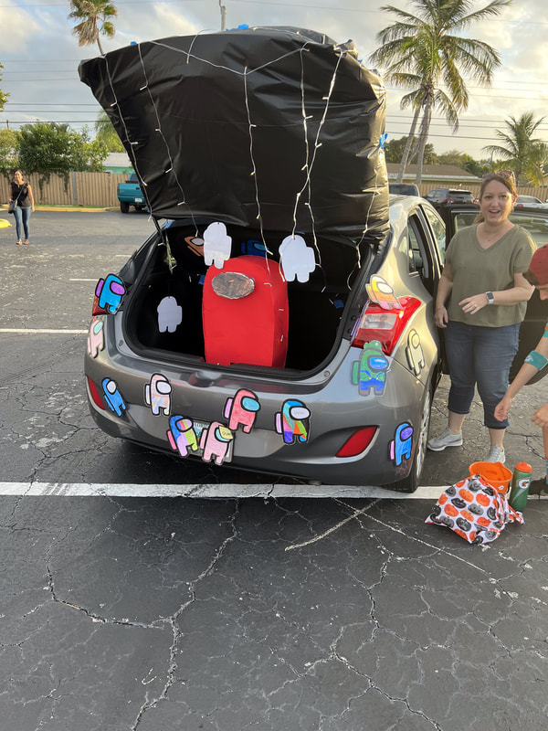 Teacher's car trunk with characters from Among Us game